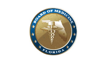 A gold and blue seal with the words board of medicine in it.